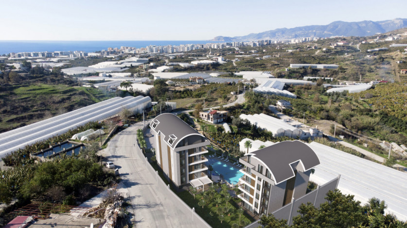 Новый проект жилых домов в красивом зеленом районе Каргыджак, 48-140 м2 - Ракурс 16