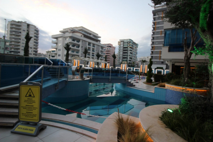 Трехкомнатная квартира с полами с подогревом в одном из больших комплексов района Махмтулар, 130 м2 - Ракурс 5