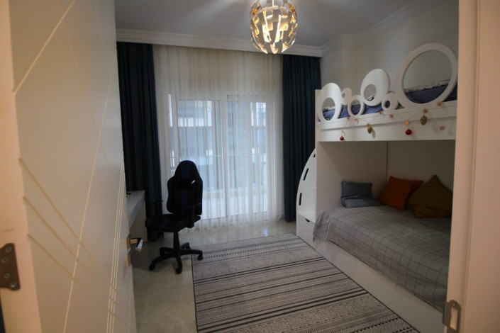 Трехкомнатная квартира с полами с подогревом в одном из больших комплексов района Махмтулар, 130 м2 - Ракурс 10