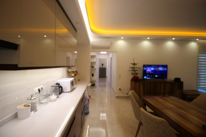 Трехкомнатная квартира с полами с подогревом в одном из больших комплексов района Махмтулар, 130 м2 - Ракурс 14