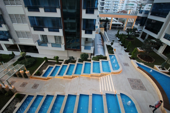 Трехкомнатная квартира с полами с подогревом в одном из больших комплексов района Махмтулар, 130 м2 - Ракурс 30