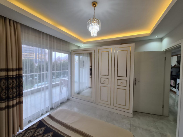 Двухкомнатная квартира с мебелью в центре района Махмутлар, 65 м2 - Ракурс 19