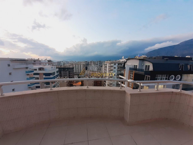 Полностью меблированный пентхаус 4+1 с видом на море и город в центре района Махмутлар, 250 м2 - Ракурс 9