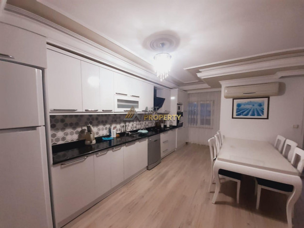 Полностью меблированный пентхаус 4+1 с видом на море и город в центре района Махмутлар, 250 м2 - Ракурс 16