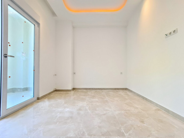 Современная двухкомнатная квартира на высоком этаже вблизи моря в Махмутлар, 60 м2 - Ракурс 7