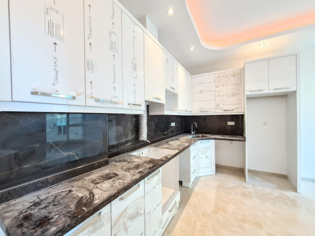 Современная двухкомнатная квартира на высоком этаже вблизи моря в Махмутлар, 60 м2 - Ракурс 17