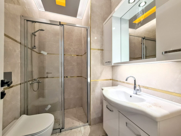 Современная двухкомнатная квартира на высоком этаже вблизи моря в Махмутлар, 60 м2 - Ракурс 20