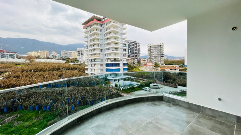 Квартира 1+1 в новостройке с новой мебелью, 60 м2 - Ракурс 12