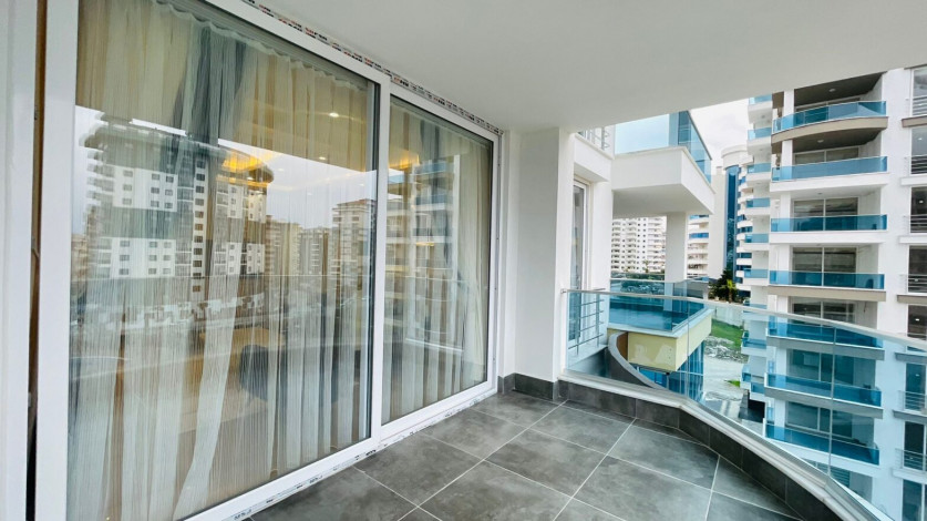 Меблированная двухкомнатная квартира в районе Махмутлар с видом на бассейн, 60м - Ракурс 4