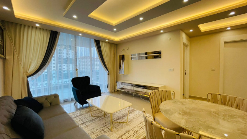 Меблированная двухкомнатная квартира в районе Махмутлар с видом на бассейн, 60м - Ракурс 6