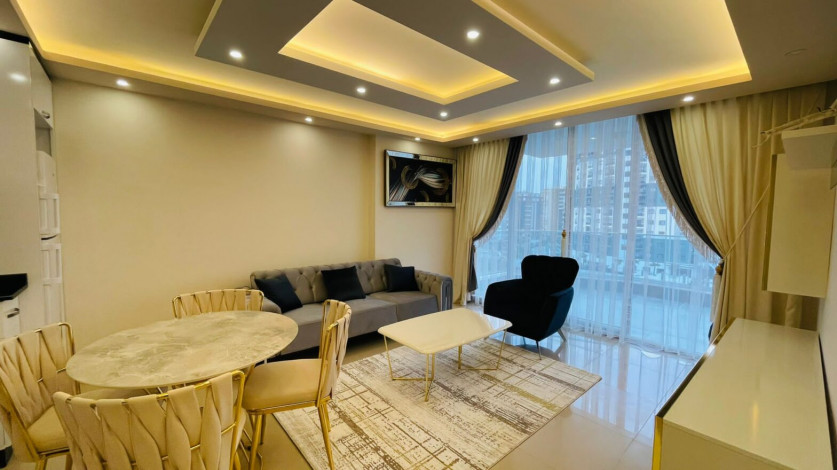 Меблированная двухкомнатная квартира в районе Махмутлар с видом на бассейн, 60м - Ракурс 8