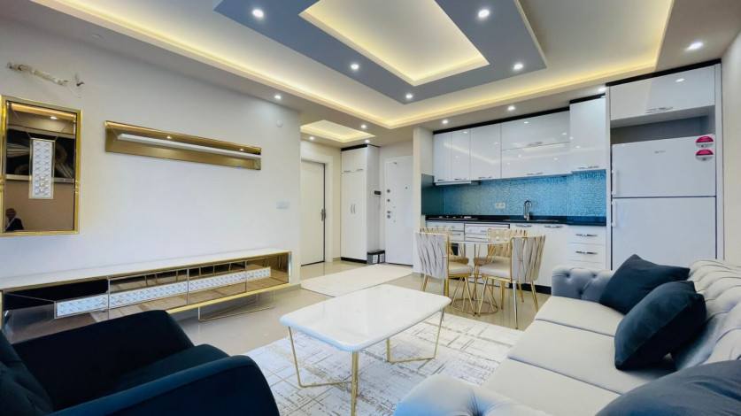 Меблированная двухкомнатная квартира в районе Махмутлар с видом на бассейн, 60м - Ракурс 9