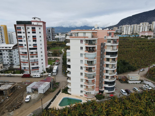 Две меблированные квартиры недалеко от вторничного рынка в районе Махмутлар,  115м - Ракурс 33