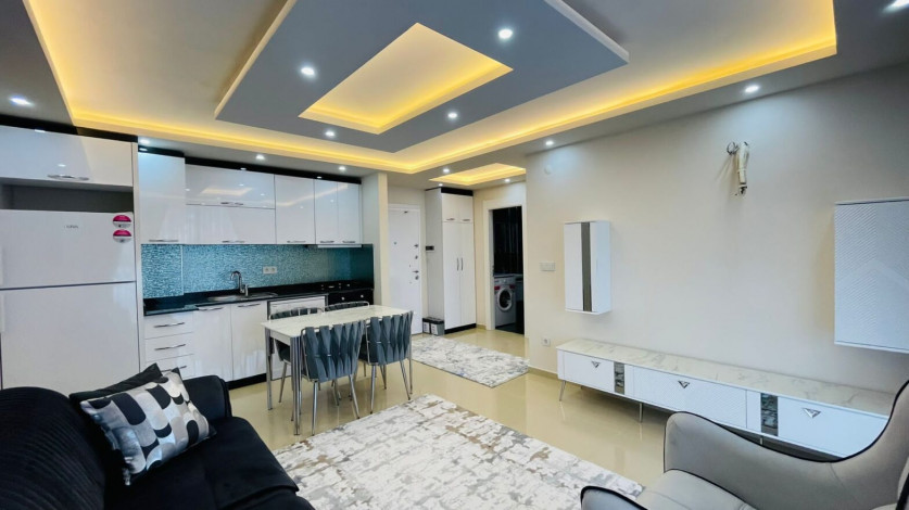 Просторная двухкомнатная квартира на высоком этаже в Махмутлар, 60м2 - Ракурс 2