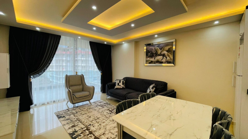 Просторная двухкомнатная квартира на высоком этаже в Махмутлар, 60м2 - Ракурс 3