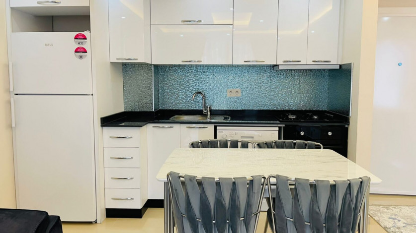 Просторная двухкомнатная квартира на высоком этаже в Махмутлар, 60м2 - Ракурс 5