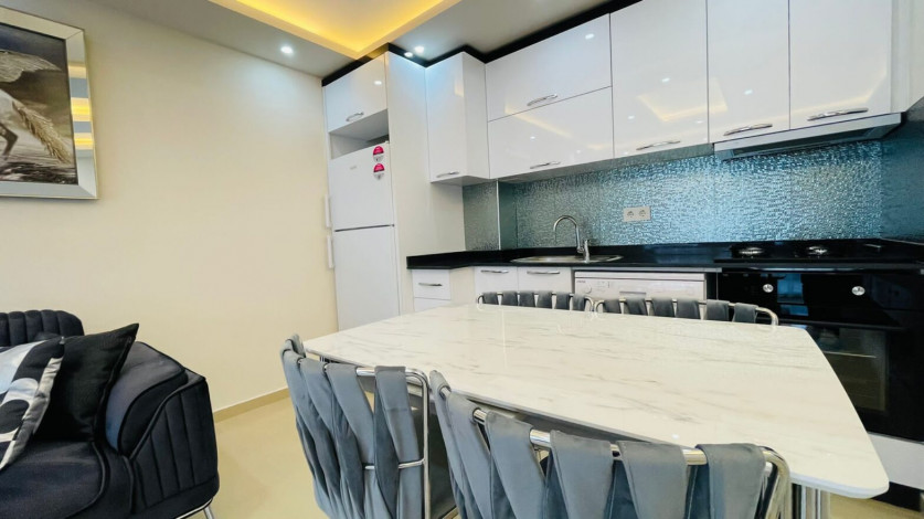 Просторная двухкомнатная квартира на высоком этаже в Махмутлар, 60м2 - Ракурс 7