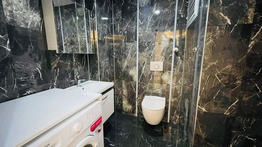 Просторная двухкомнатная квартира на высоком этаже в Махмутлар, 60м2 - Ракурс 10