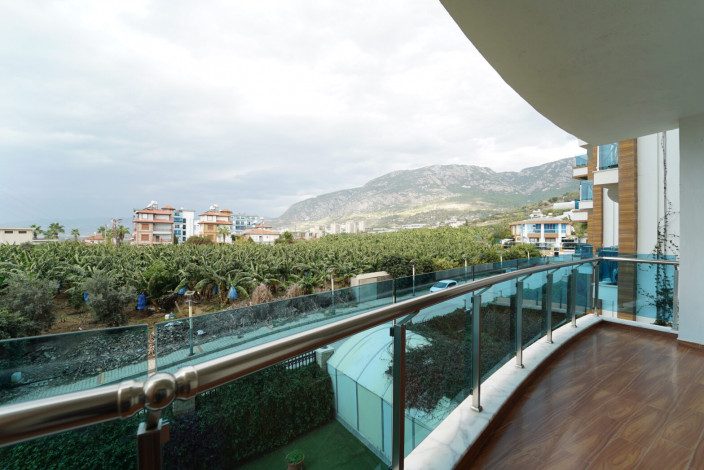 Трехкомнатные меблированные апартаменты с видом на море и горы в районе Махмутлар, 107м - Ракурс 2