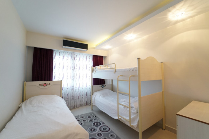 Трехкомнатные меблированные апартаменты с видом на море и горы в районе Махмутлар, 107м - Ракурс 12