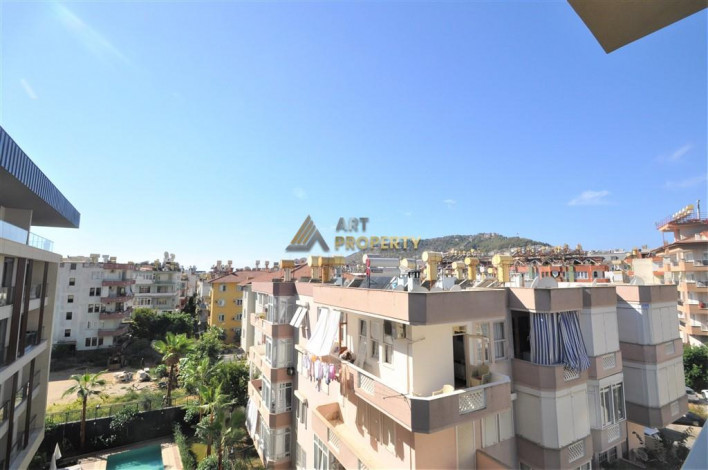 Двухкомнатная квартира в новом доме в самом центре города Аланья, 55 м2 - Ракурс 21