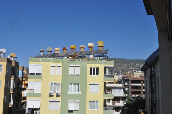 Двухкомнатная квартира в новом доме в самом центре города Аланья, 55 м2 - Ракурс 25