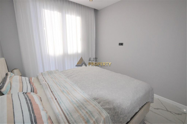 Двухкомнатная квартира в новом доме в самом центре города Аланья, 55 м2 - Ракурс 30