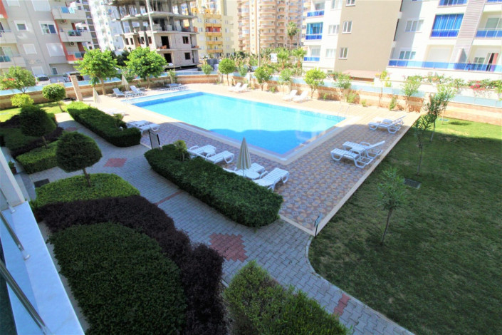 Меблированная квартира 1+1 вблизи от моря в районе Махмутлар, 75 м2 - Ракурс 4