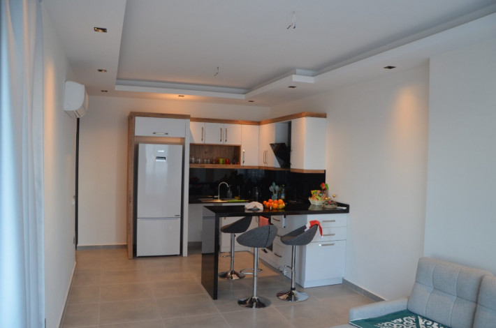 Меблированная двухкомнатная квартира в комплексе с полной инфраструктурой в Махмутлар, 60 м2 - Ракурс 5