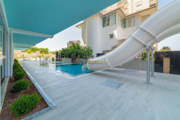 Просторные апартаменты 1+1 в комплексе с полной инфраструктурой в районе Махмутлар, 65 м2 - Ракурс 7