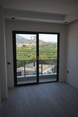 Просторные апартаменты 1+1 в комплексе с полной инфраструктурой в районе Махмутлар, 65 м2 - Ракурс 15