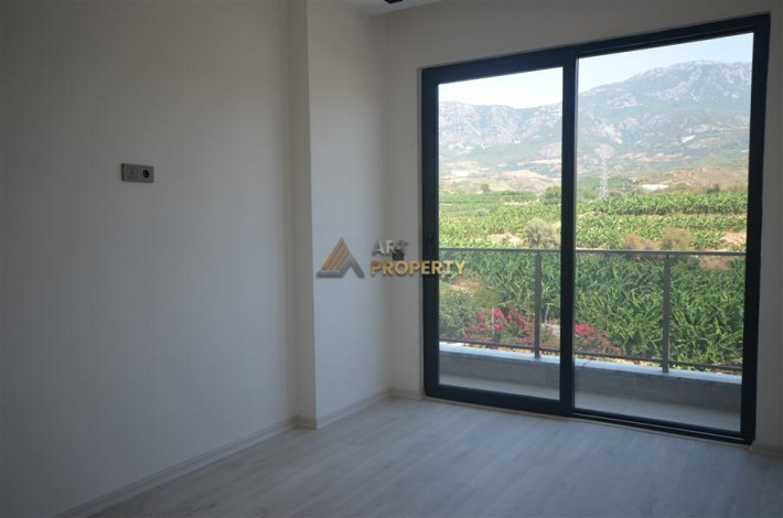 Просторные апартаменты 1+1 в комплексе с полной инфраструктурой в районе Махмутлар, 65 м2 - Ракурс 17