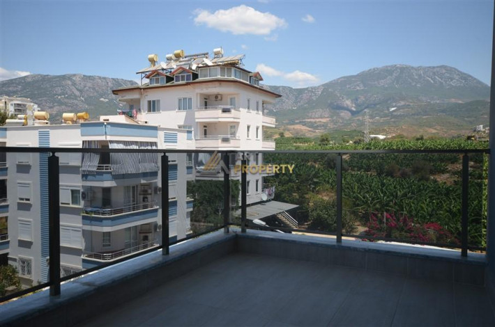 Просторные апартаменты 1+1 в комплексе с полной инфраструктурой в районе Махмутлар, 65 м2 - Ракурс 23