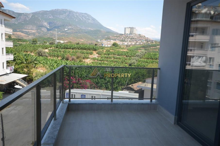 Просторные апартаменты 1+1 в комплексе с полной инфраструктурой в районе Махмутлар, 65 м2 - Ракурс 24