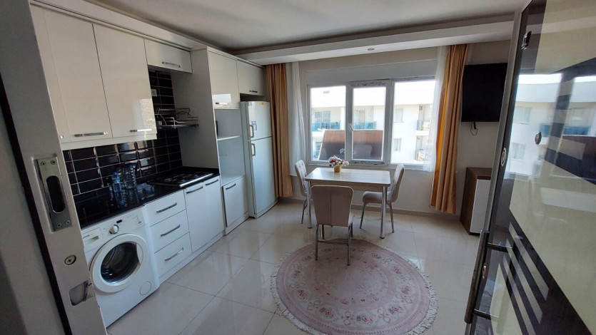 Двухкомнатная меблированная квартира-дуплекс на высоком этаже в Махмутларе, 65 м2 - Ракурс 4