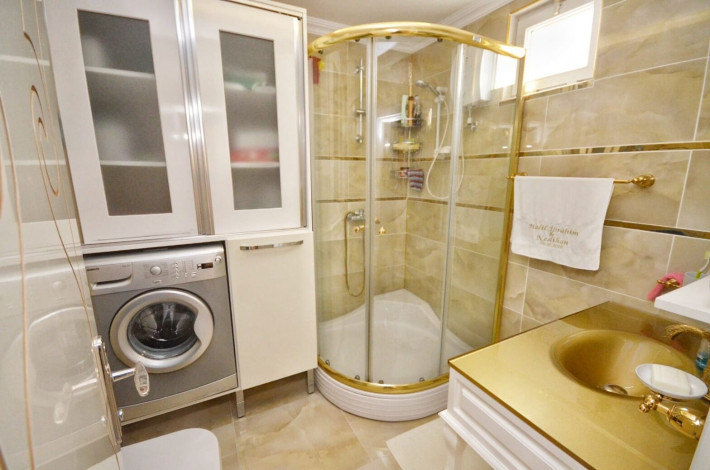 Меблированная трехкомнатная квартира в 150 метрах от моря в центре Махмутлара, 105 м2 - Ракурс 15