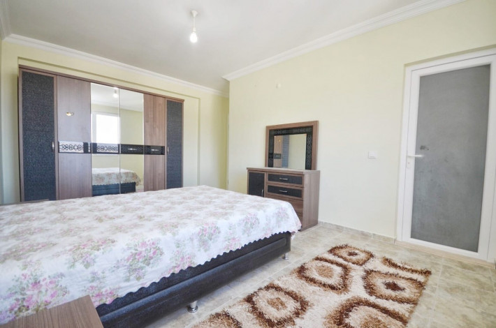 Меблированная квартира 2+1 с отдельной кухней в районе Махмутлар, 125 м2 - Ракурс 7