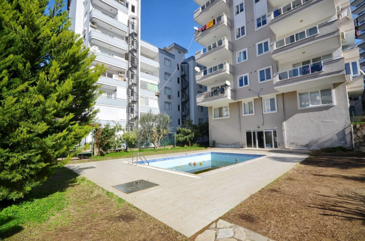 Меблированная квартира 2+1 с отдельной кухней в районе Махмутлар, 125 м2 - Ракурс 20