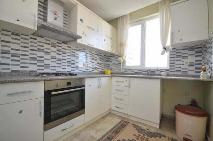 Меблированная квартира 2+1 с отдельной кухней в районе Махмутлар, 125 м2 - Ракурс 24