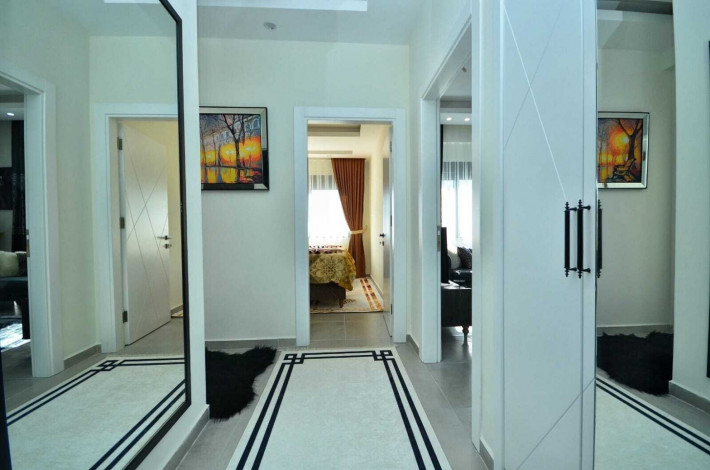 Трехкомнатная квартира с люксовой мебелью в комплексе с инфраструктурой в Махмутларе, 100 м2 - Ракурс 2