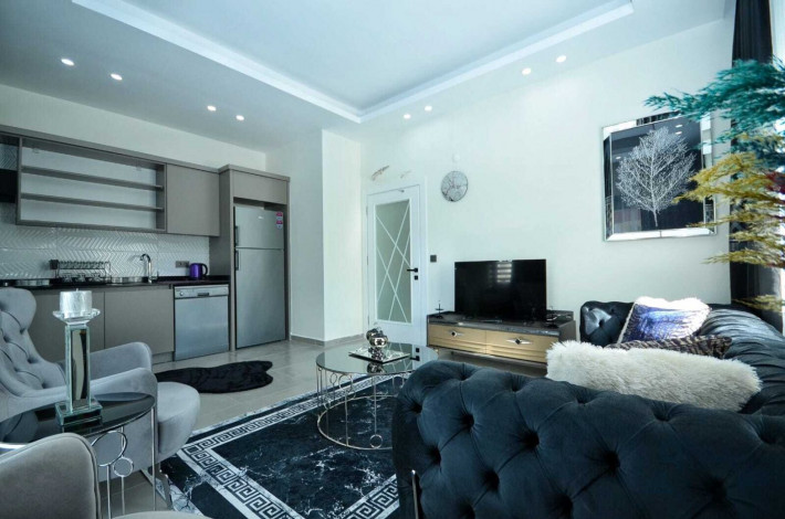 Трехкомнатная квартира с люксовой мебелью в комплексе с инфраструктурой в Махмутларе, 100 м2 - Ракурс 6