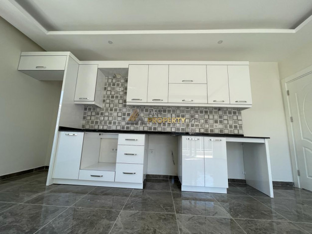 Квартиры 1+1 в новом проекте комплекса с собственной инфаструктурой в районе Авсаллар, 48м2 - Ракурс 4