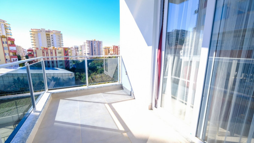 Меблированная двухкомнатная квартира в районе Махмутлар, 59м - Ракурс 3