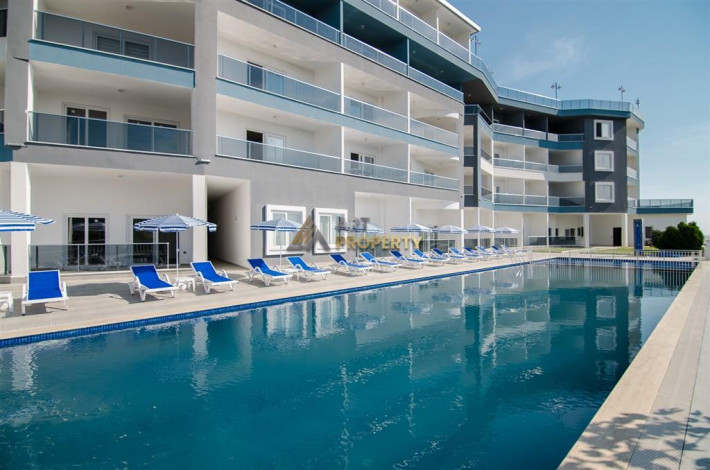 Двухкомнатная квартира в комплексе с инфраструктурой в районе Каргыджак, 56 м2. - Ракурс 3