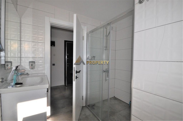 Двухкомнатная квартира в комплексе с инфраструктурой в районе Каргыджак, 56 м2. - Ракурс 11