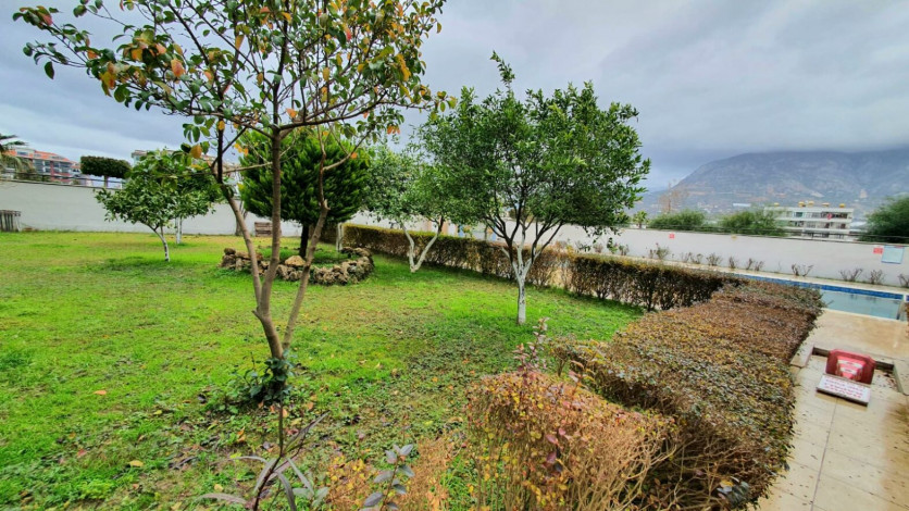 Меблированная трехкомнатная квартира с видом на море и горы на границе районов Махмутлар и Кестель, 90м - Ракурс 21