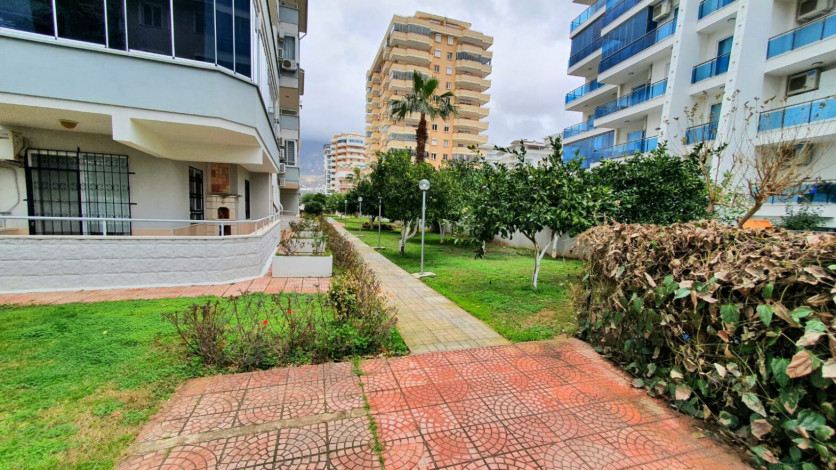 Меблированная трехкомнатная квартира с видом на море и горы на границе районов Махмутлар и Кестель, 90м - Ракурс 22