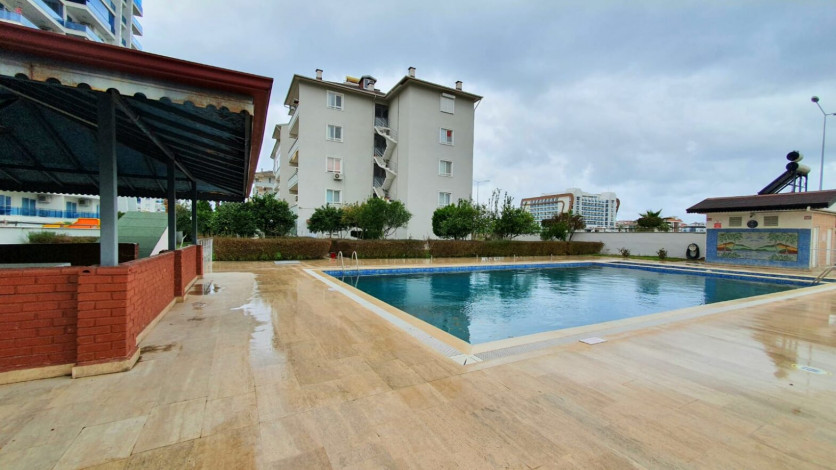 Меблированная трехкомнатная квартира с видом на море и горы на границе районов Махмутлар и Кестель, 90м - Ракурс 23