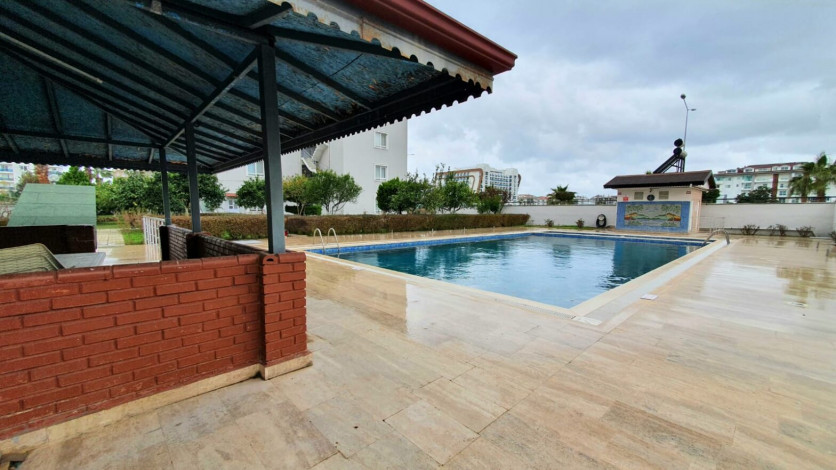 Меблированная трехкомнатная квартира с видом на море и горы на границе районов Махмутлар и Кестель, 90м - Ракурс 24