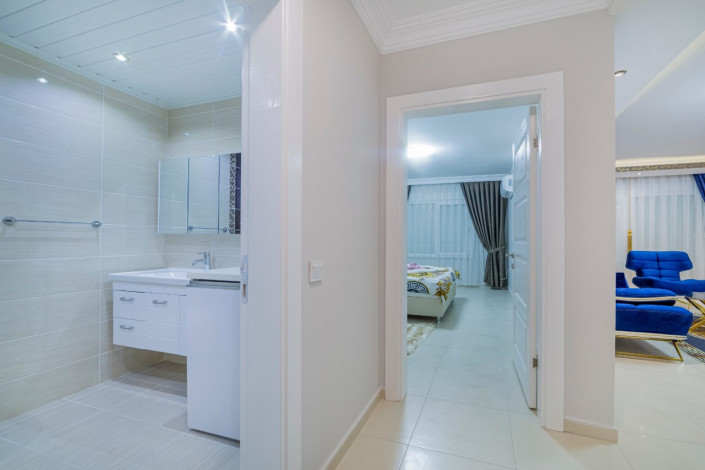 Просторная меблированная квартира 1+1 в комплексе с инфраструктурой в Махмутлар, 75 м2 - Ракурс 2